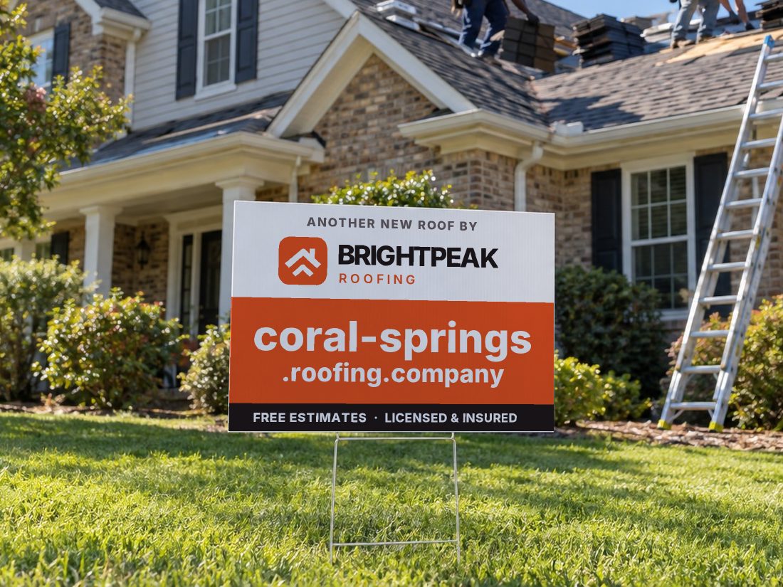 coral-springs.roofing.company on a yard sign in front of a house getting a new roof